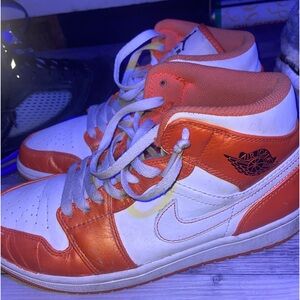 Orange and white Jordan 1s